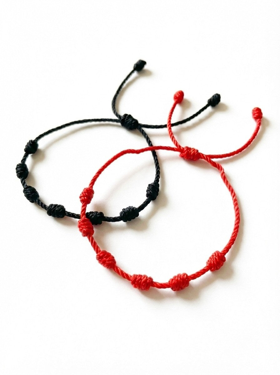Bracelet porte-bonheur tibétain à 7 nœuds tressé à la main